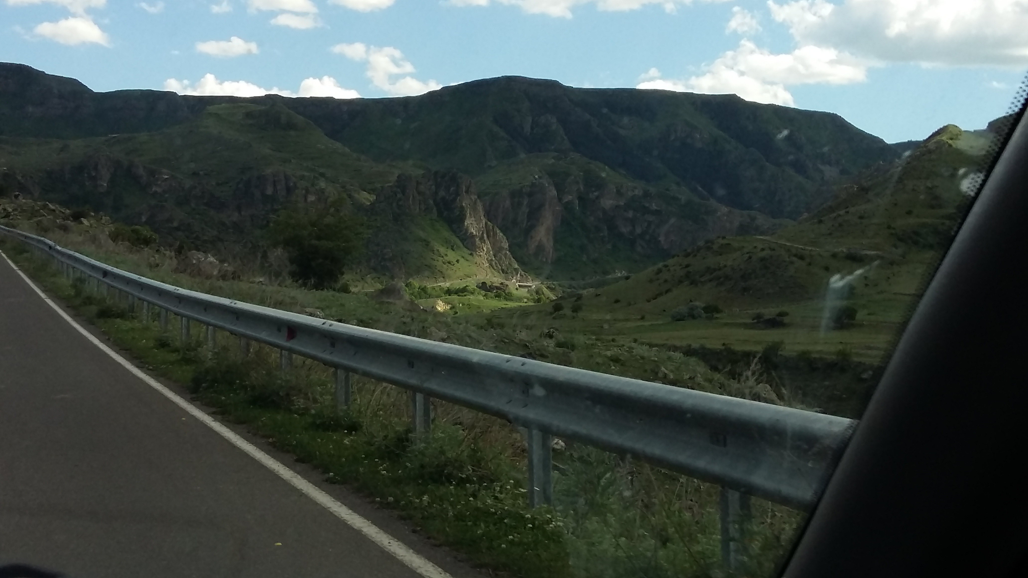 A sunbeam striking a mountain gorge.