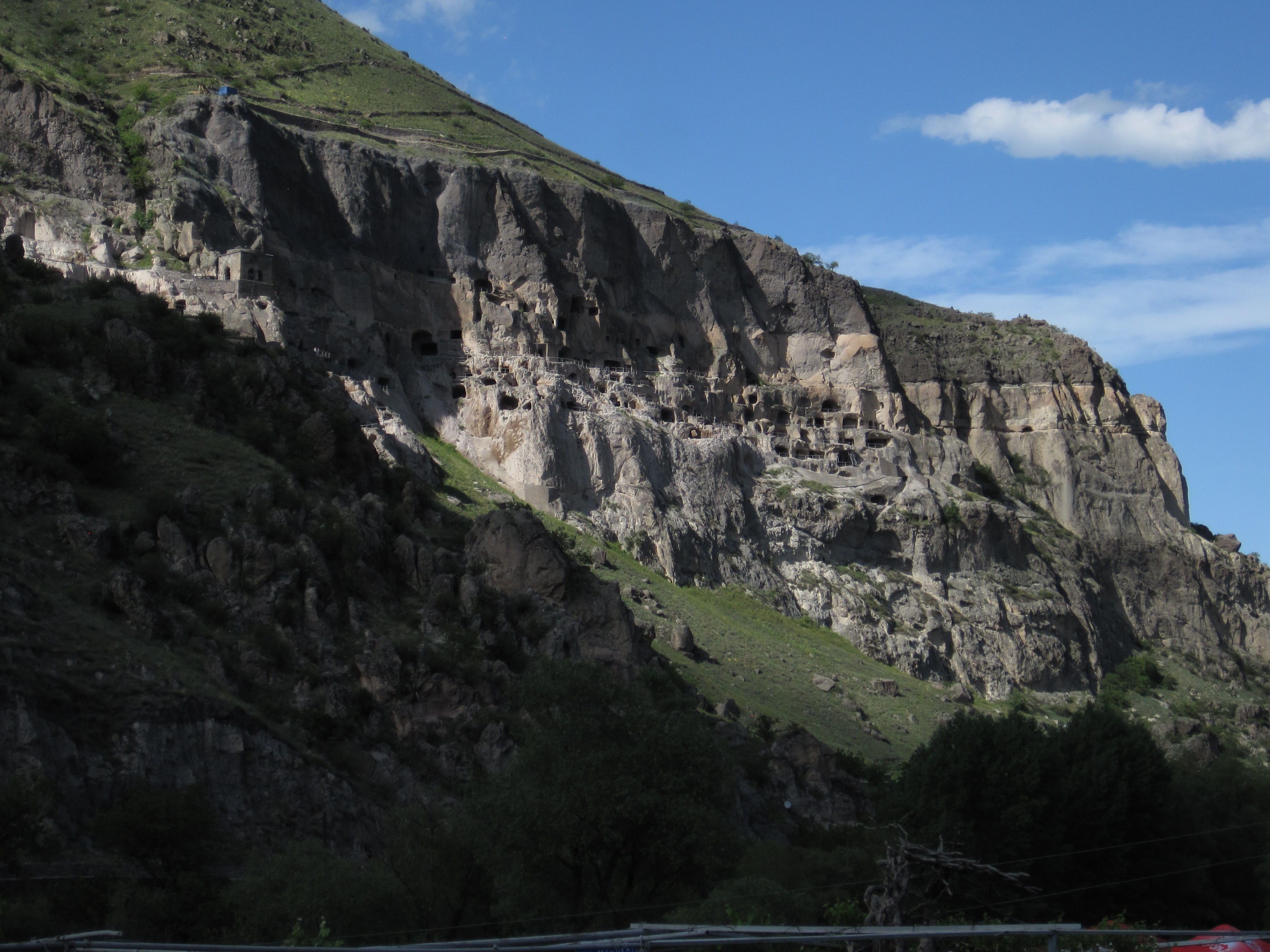 Cave town of Vardzia, set in a cliff, which is part of the side of a valley.