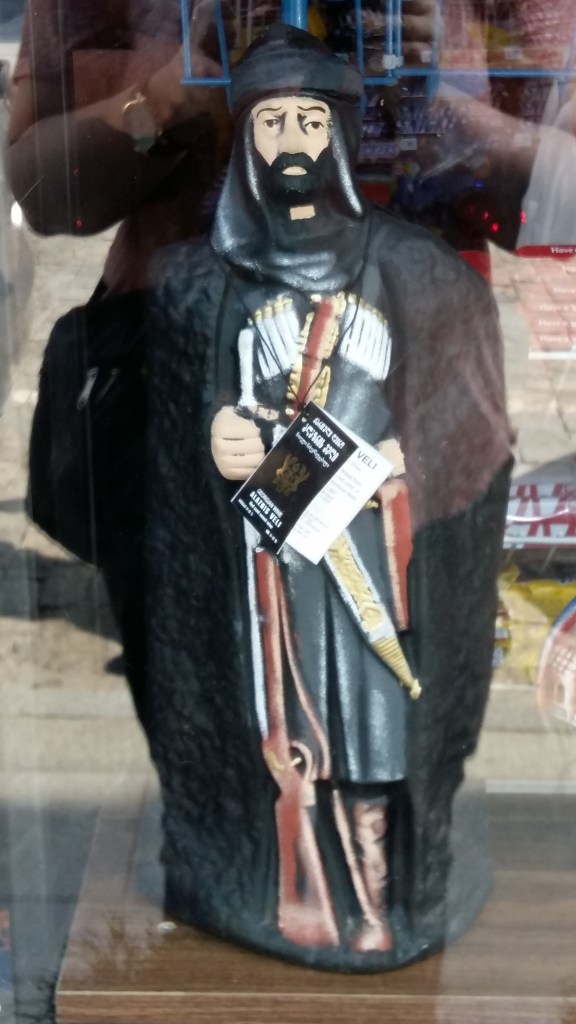 Bottle of wine shaped like Data Tutashkhia.